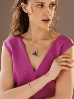 Broszka - zawieszka z białego złota z brylantami i szafirami - motyl - próba 750