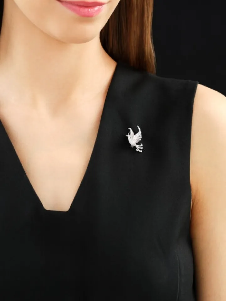 Broszka - zawieszka z białego złota z brylantami i szafirem - ptak - próba 750