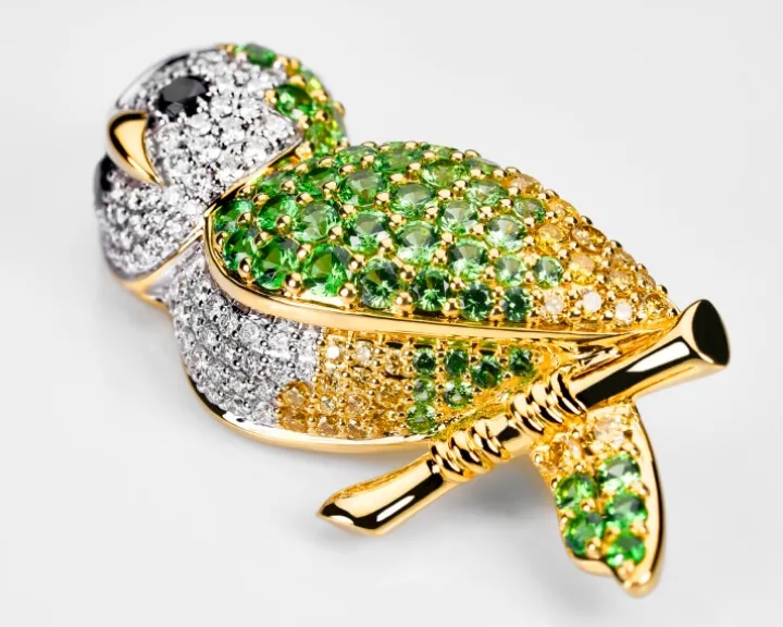 Broszka z żółtego złota z brylantami i granatami - sowa - próba 750