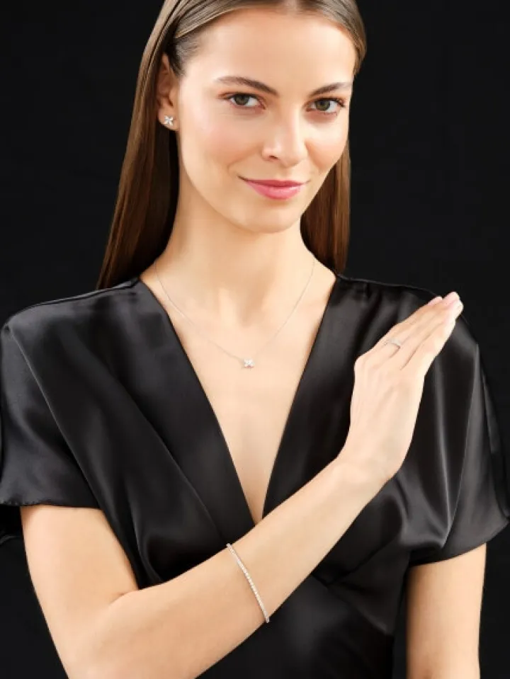 Kolczyki z białego złota z diamentami - kwiaty - 0,73 ct - próba 585