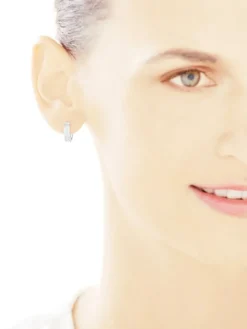 Kolczyki z białego złota z diamentami - koła - 0,06 ct - próba 585