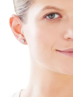 Kolczyki z białego złota z diamentami - 0,19 ct - próba 585