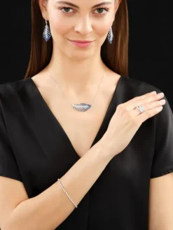 Kolczyki z białego złota z  brylantami i szafirami cejlońskimi - piórka - próba 750