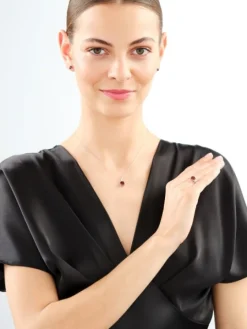 Kolczyki z białego złota z diamentami i granatami - próba 585