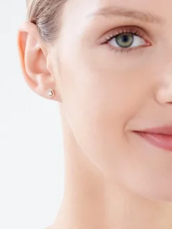 Kolczyki z żółtego i białego złota z diamentami - 0,13 ct - próba 585