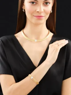 Kolczyki z żółtego i białego złota z brylantami - 0,26 ct - próba 750