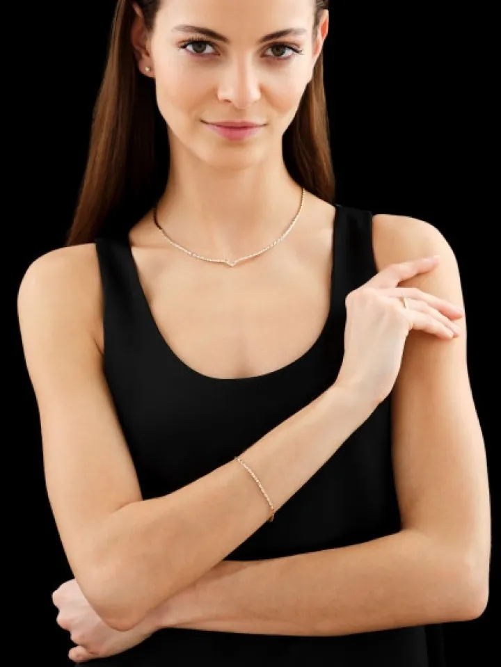 Kolczyki z żółtego i białego złota z brylantami - serca - 0,12 ct - próba 585