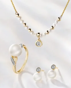 Kolczyki z żółtego i białego złota z diamentami i perłami - próba 585