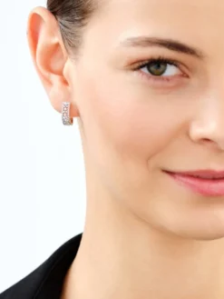 Kolczyki z żółtego złota z diamentami - koła - 0,25 ct - próba 585