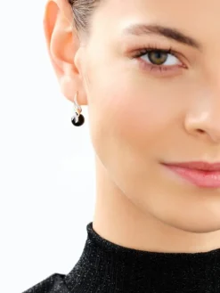 Kolczyki z żółtego złota z diamentami i onyksami - próba 585