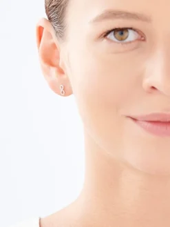 Kolczyki z żółtego złota z diamentami - nieskończoność - 0,09 ct - próba 585