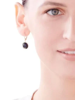 Kolczyki z żółtego złota z diamentami i onyksami - próba 585