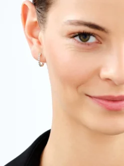 Kolczyki z żółtego złota z diamentami - koła - 0,05 ct - próba 585