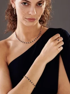 Kolczyki z żółtego złota z diamentami i szafirami - próba 585