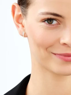 Kolczyki z żółtego złota z diamentami - skrzydła - 0,02 ct - próba 585