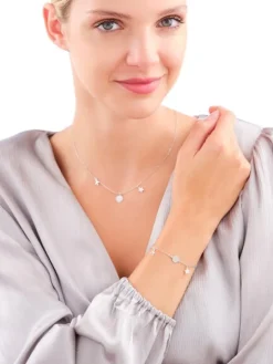 Naszyjnik srebrny z cyrkoniami - kula ziemska, samolot, gwiazda