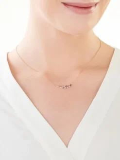 Naszyjnik z różowego złota z diamentami, kamieniami szlachetnymi i ozdobnymi - liście - próba 375