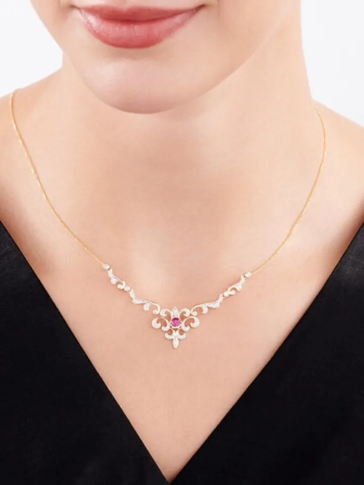 Naszyjnik z żółtego złota z brylantami i rubinem - próba 585