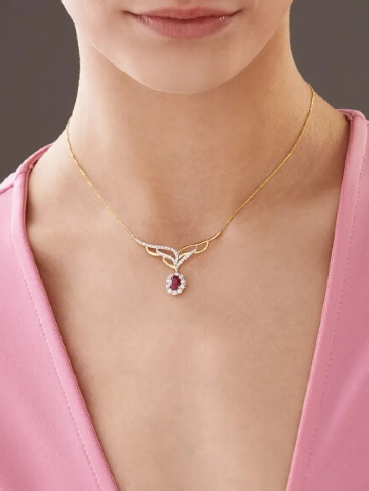 Naszyjnik z żółtego złota z brylantami i rubinem - próba 585