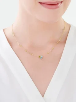 Naszyjnik z żółtego złota z diamentem, peridotami i topazami - próba 375