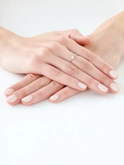 Pierścionek z białego złota z brylantem - 0,14 ct - próba 585