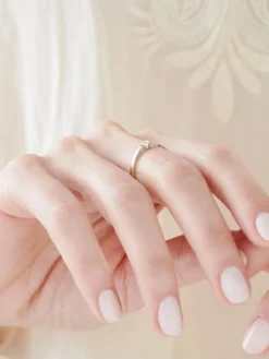 Pierścionek z białego złota z brylantem - 0,12 ct - próba 585