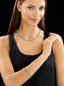 Pierścionek z białego złota z brylantami i szmaragdem - próba 750