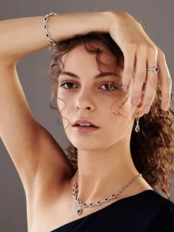 Pierścionek z białego złota z brylantami i szafirem - próba 585