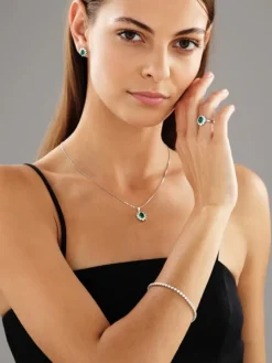 Pierścionek z białego złota z brylantami i szmaragdem - próba 585