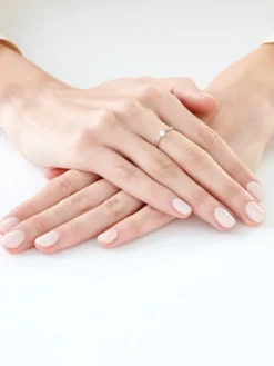 Pierścionek z białego złota z brylantem - 0,11 ct - próba 375