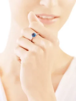 Pierścionek z białego złota z diamentami i topazem London Blue - próba 375