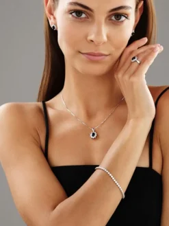 Pierścionek z białego złota z brylantami i szafirem - próba 585