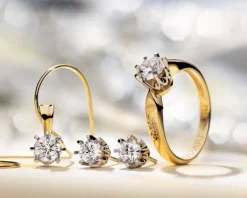 Pierścionek z żółtego i białego złota z brylantem - 0,10 ct - próba 585