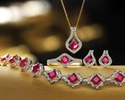 Pierścionek z żółtego złota z diamentami i rubinem - próba 585