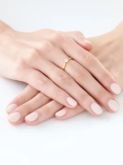 Pierścionek z żółtego złota z brylantem - 0,18 ct - próba 750