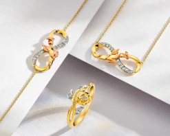 Pierścionek z żółtego złota z diamentami - róża - 0,04 ct - próba 375