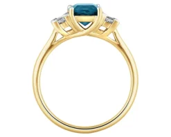 Pierścionek z żółtego złota z diamentami i topazem London Blue - próba 585