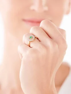 Pierścionek z żółtego złota z diamentami i szmaragdem - rozeta - próba 585