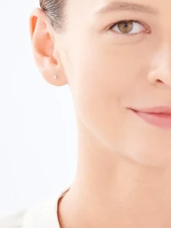 Pojedynczy kolczyk srebrny z cyrkonią - gwiazda