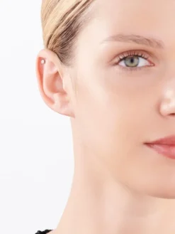 Pojedynczy kolczyk z białego złota z brylantem - 0,01 ct - próba 375