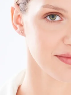 Pojedynczy kolczyk z żółtego złota z diamentem - serce - 0,003 ct - próba 375