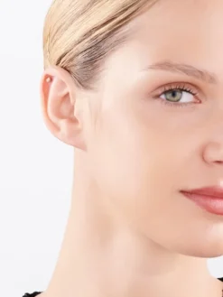 Pojedynczy kolczyk z żółtego i białego złota z brylantem - 0,01 ct - próba 375