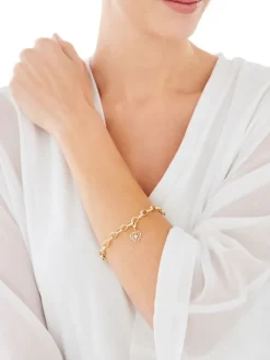 Zawieszka charms z żółtego złota z brylantem - serce - 0,008 ct - próba 375