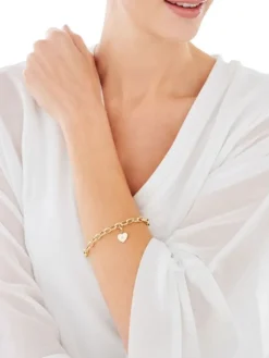 Zawieszka charms z żółtego złota z diamentem - serce - 0,003 ct - próba 375