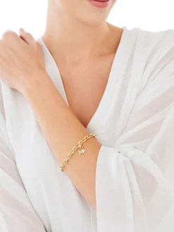 Zawieszka charms z żółtego złota z diamentem - litera M, serce - 0,004 ct - próba 375