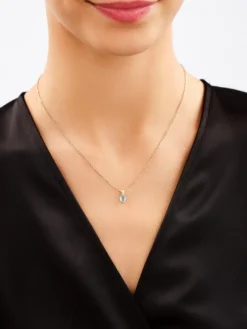 Zawieszka i kolczyki  z żółtego złota z diamentami i topazami - komplet - próba 375