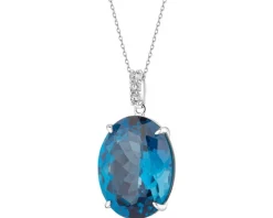 Zawieszka z białego złota z brylantami i topazem London Blue - próba 585