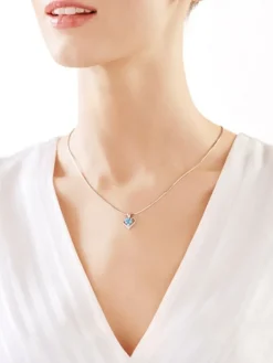 Zawieszka z białego złota z diamentem i topazem - serce - próba 375