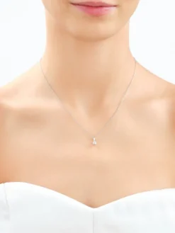 Zawieszka z białego złota z brylantem - serca - 0,16 ct - próba 585