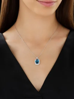 Zawieszka z białego złota z brylantami i topazem London Blue - próba 585